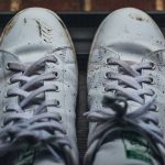 gray and white nike athletic shoes