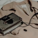 black and gray leather sling bag
