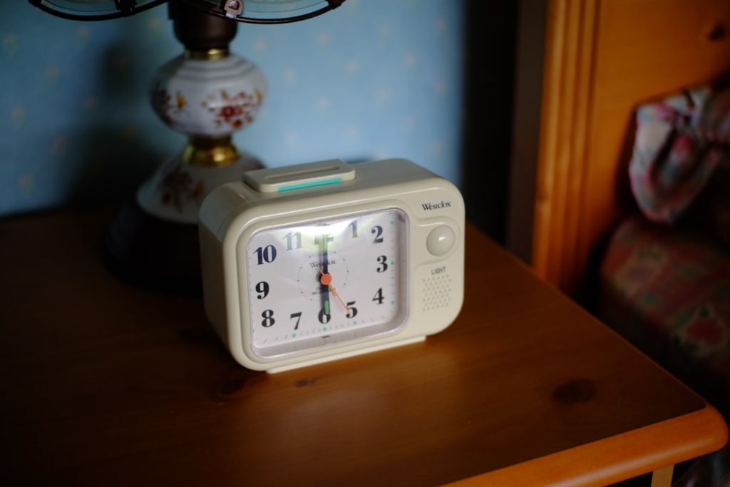white analog clock at 10 00