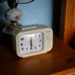white analog clock at 10 00