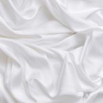 a close up view of a white fabric