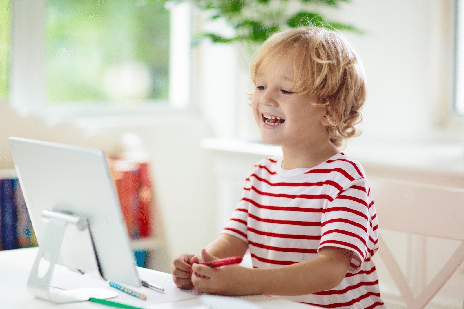 Novakid's gamified virtual classroom showing interactive language games for kids
