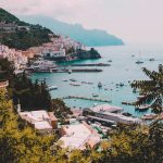 landscape photo of village houses near ocean