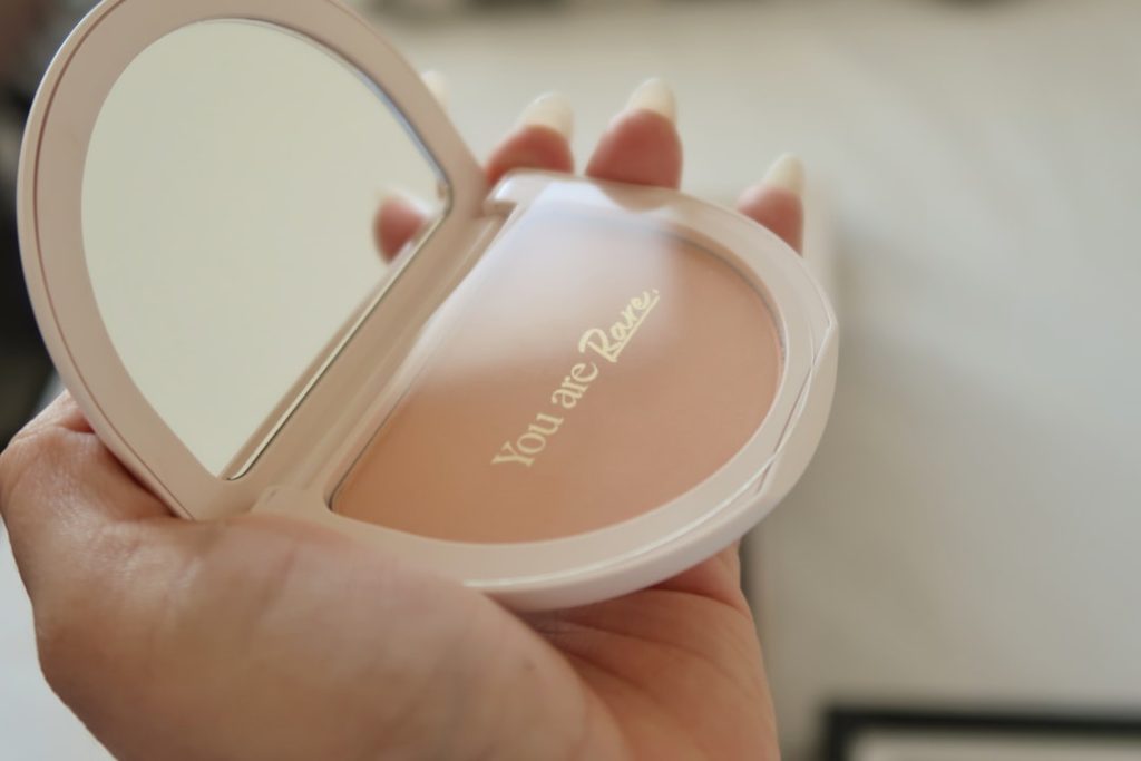 A person holding a compact compact compact compact compact compact compact compact compact compact compact compact