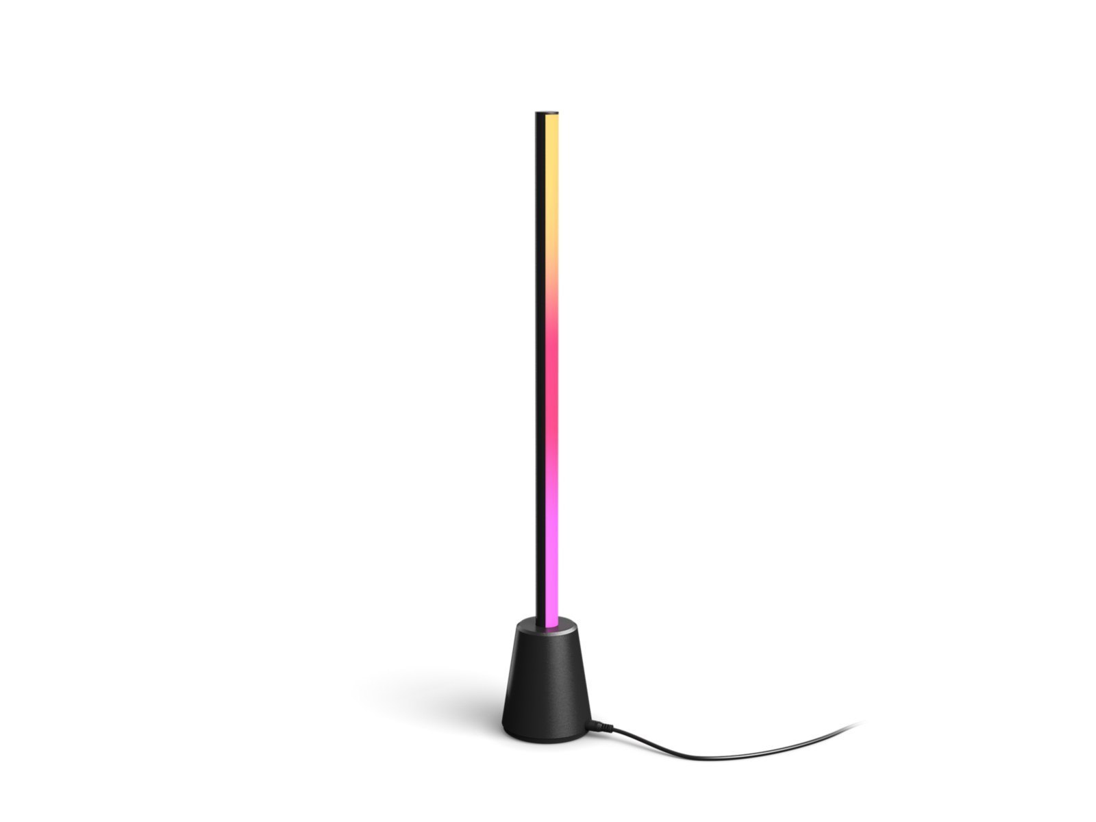 Philips Hue Play table lamp creating colourful ambient lighting in a living room