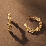 Agapee official jewelry editorial image with warm Mediterranean styling