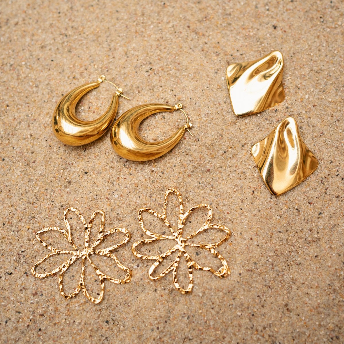 Balaboosté stainless-steel jewelry arranged in a polished fashion edit