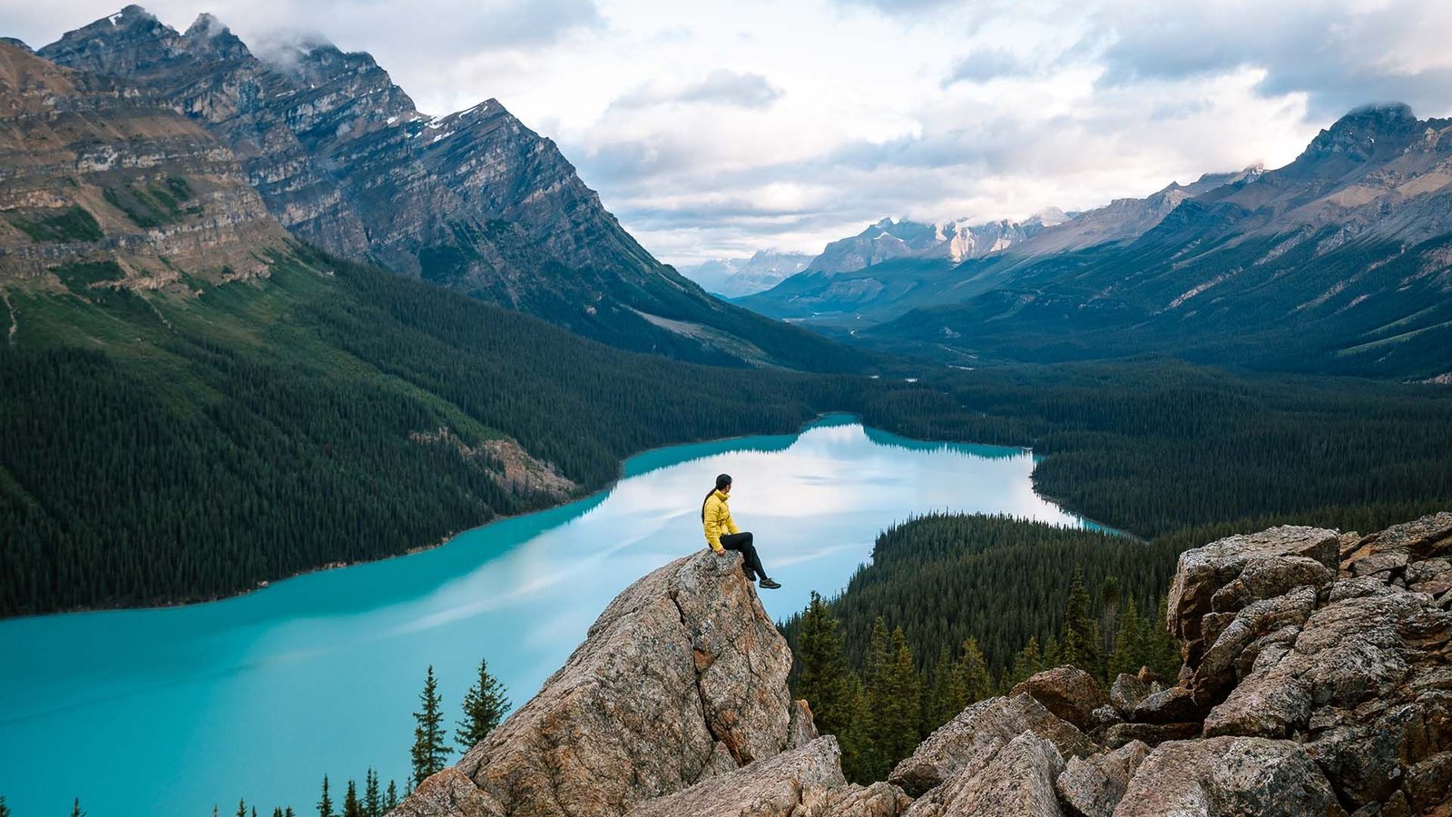 Traveller enjoying a scenic overlook during an Enterprise road trip