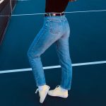 person standing on tennis court