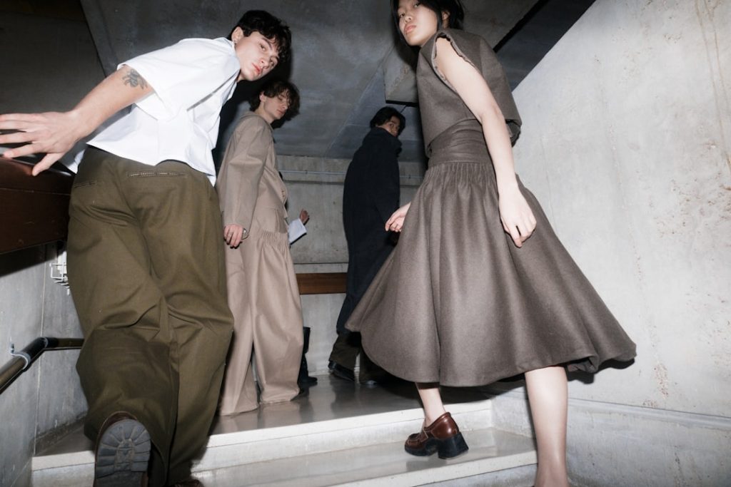 People are descending a staircase together